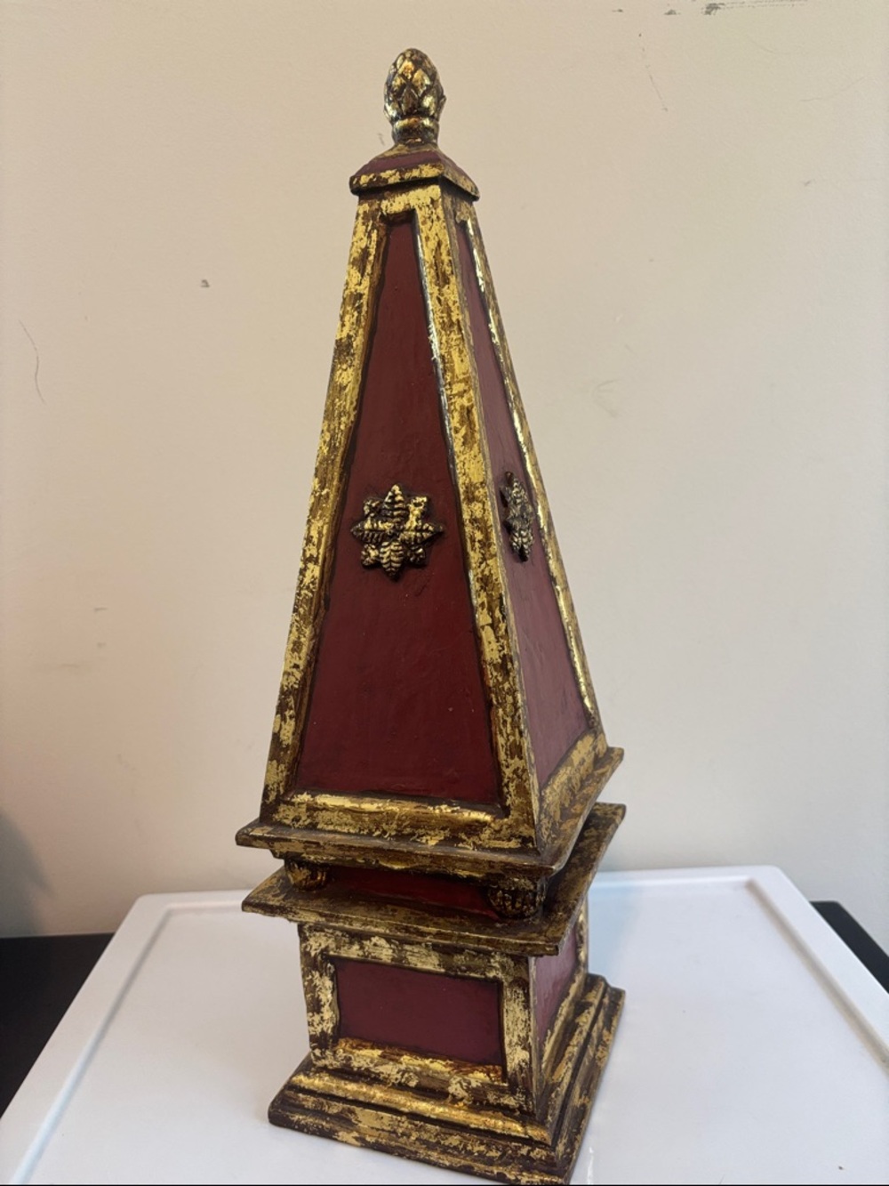 Decorative Red and Gold Pyramid Obelisk
Plastic